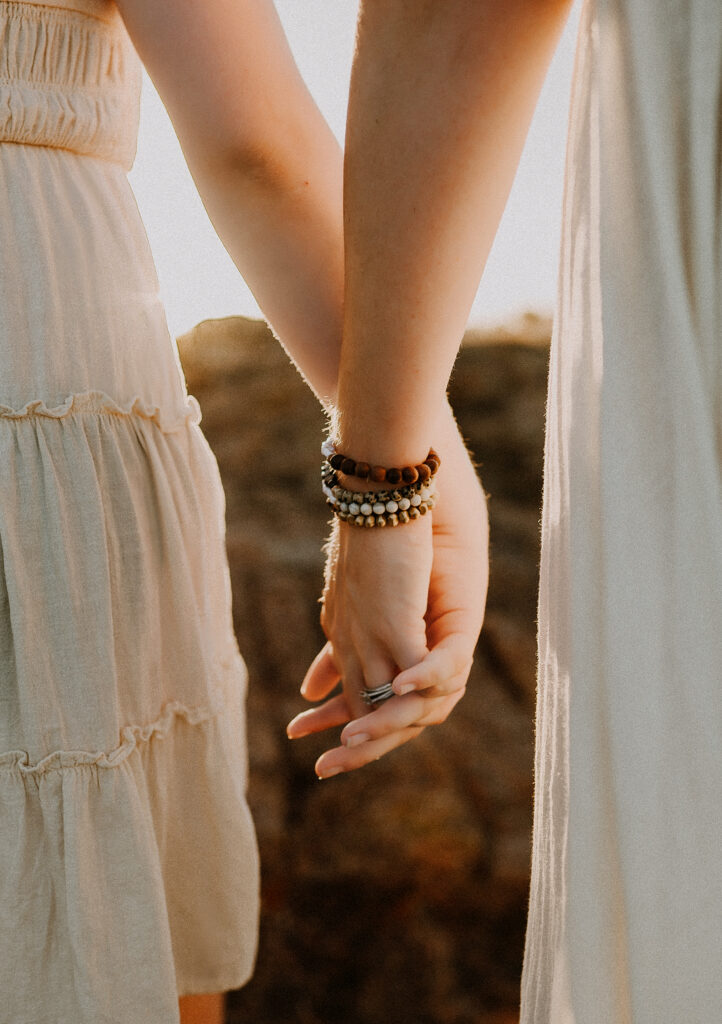 Mom and daughter holding hands in Oklahoma 